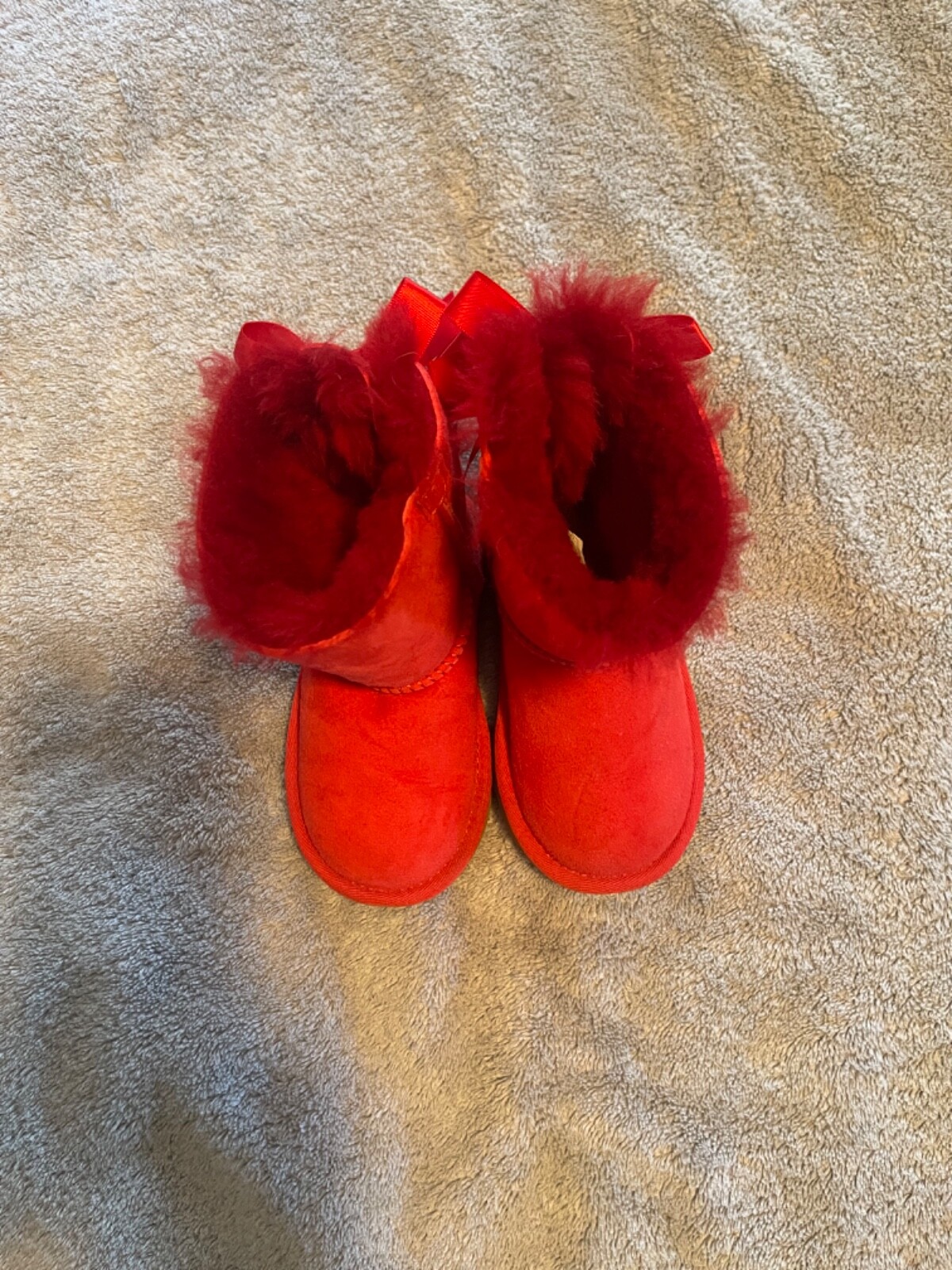 UGG BAILEY BOWS girls boots- red suede- Size 7 – preowned. $45