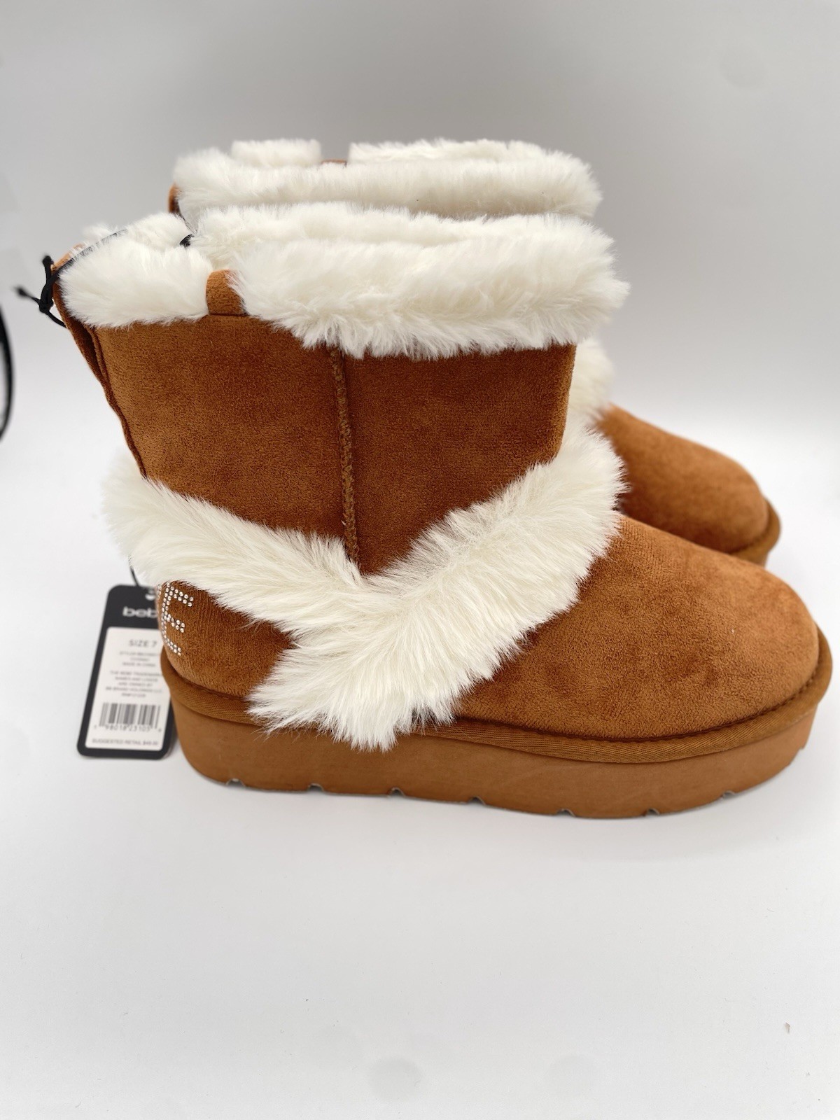Women BEBE Women Winter Boots With Faux Fur  Size 7